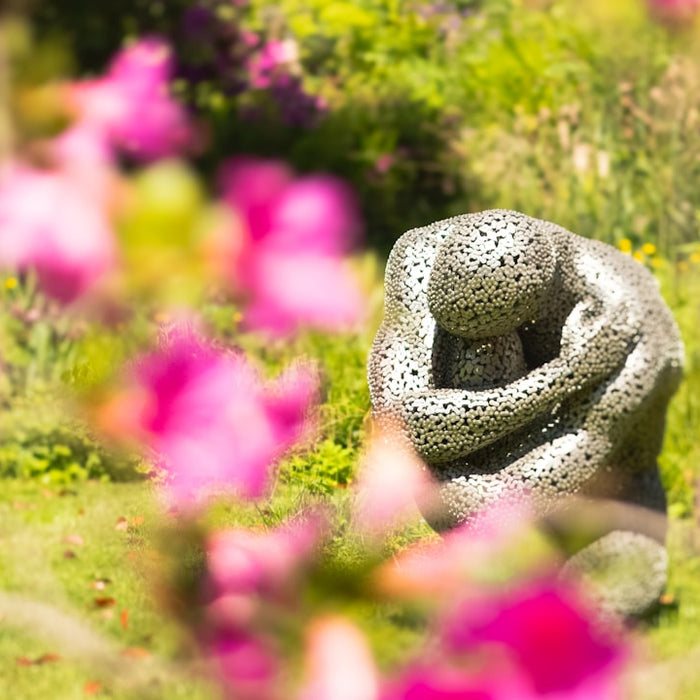 Unearthing the Beauty: What Makes a Great Metal Flower Sculpture?