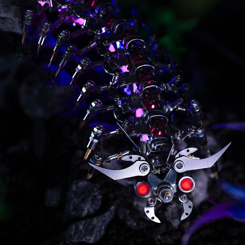 Close-up of a mechanical device with glowing red elements on a dark background