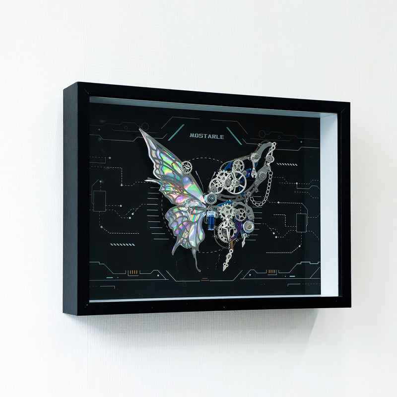 Framed artwork of a butterfly with mechanical elements on a black background