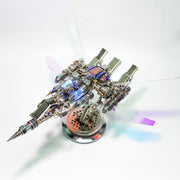 Metallic model of a spaceship with glowing elements on a white background
