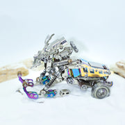Metallic robot model on a light background
