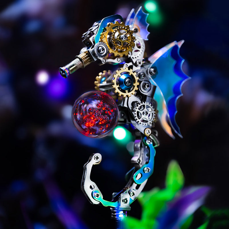 Decorative key with mechanical design and glowing red sphere on a dark background