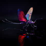 Colorful insect on a reflective surface with a dark background