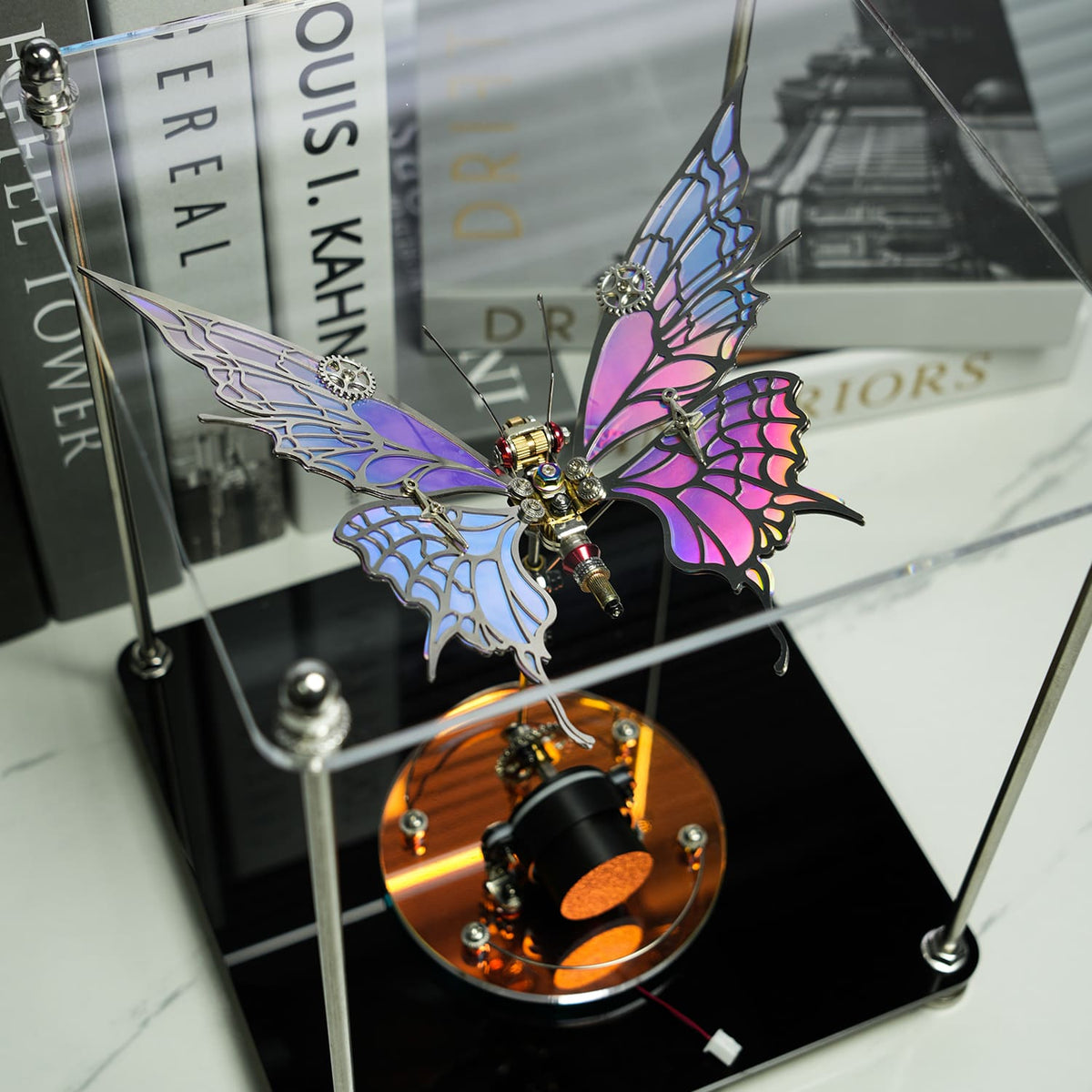 Decorative butterfly clock with colorful wings on a stand