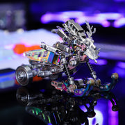 Metallic dragon sculpture with mechanical elements on a reflective surface, colorful blurred background