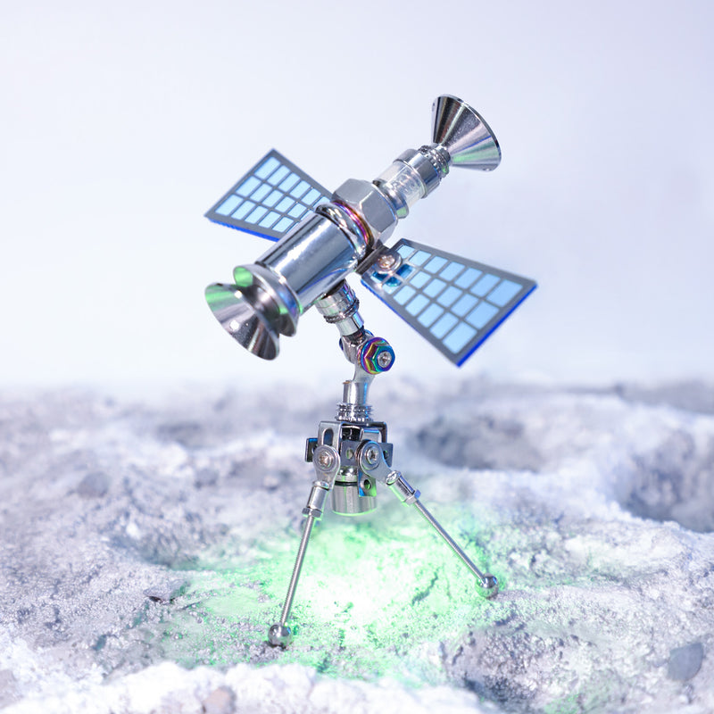 Model of a space probe on a snowy landscape