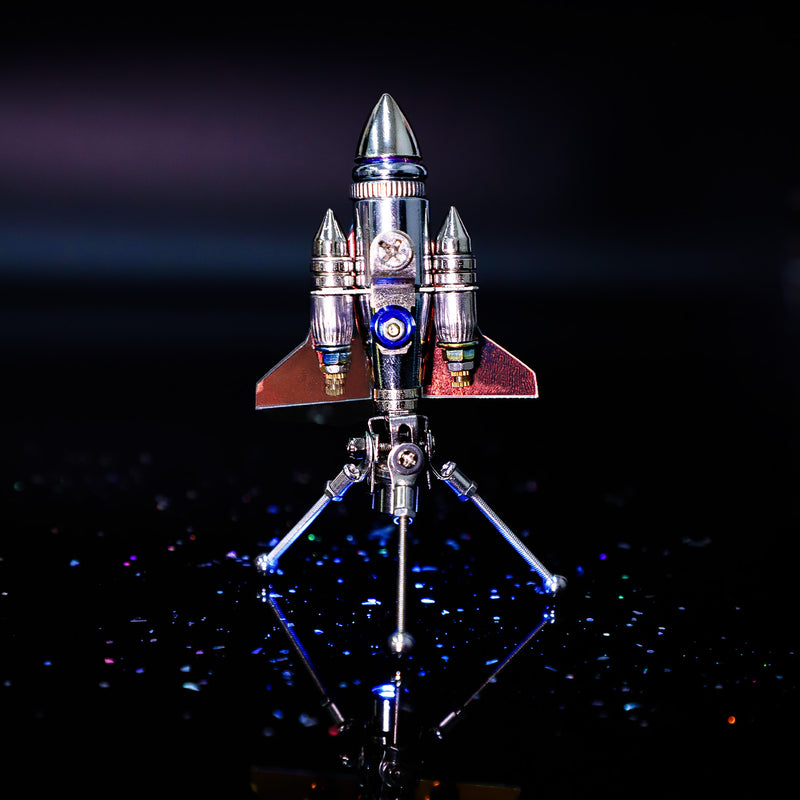 Model rocket on a stand with a dark background