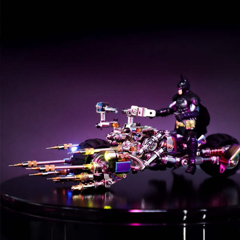 Toy figure of a superhero on a motorcycle with colorful weapons against a dark background