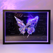 Framed artwork of a butterfly with mechanical elements on a dark background