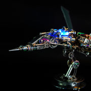 Tattoo machine with glowing blue light on a black background