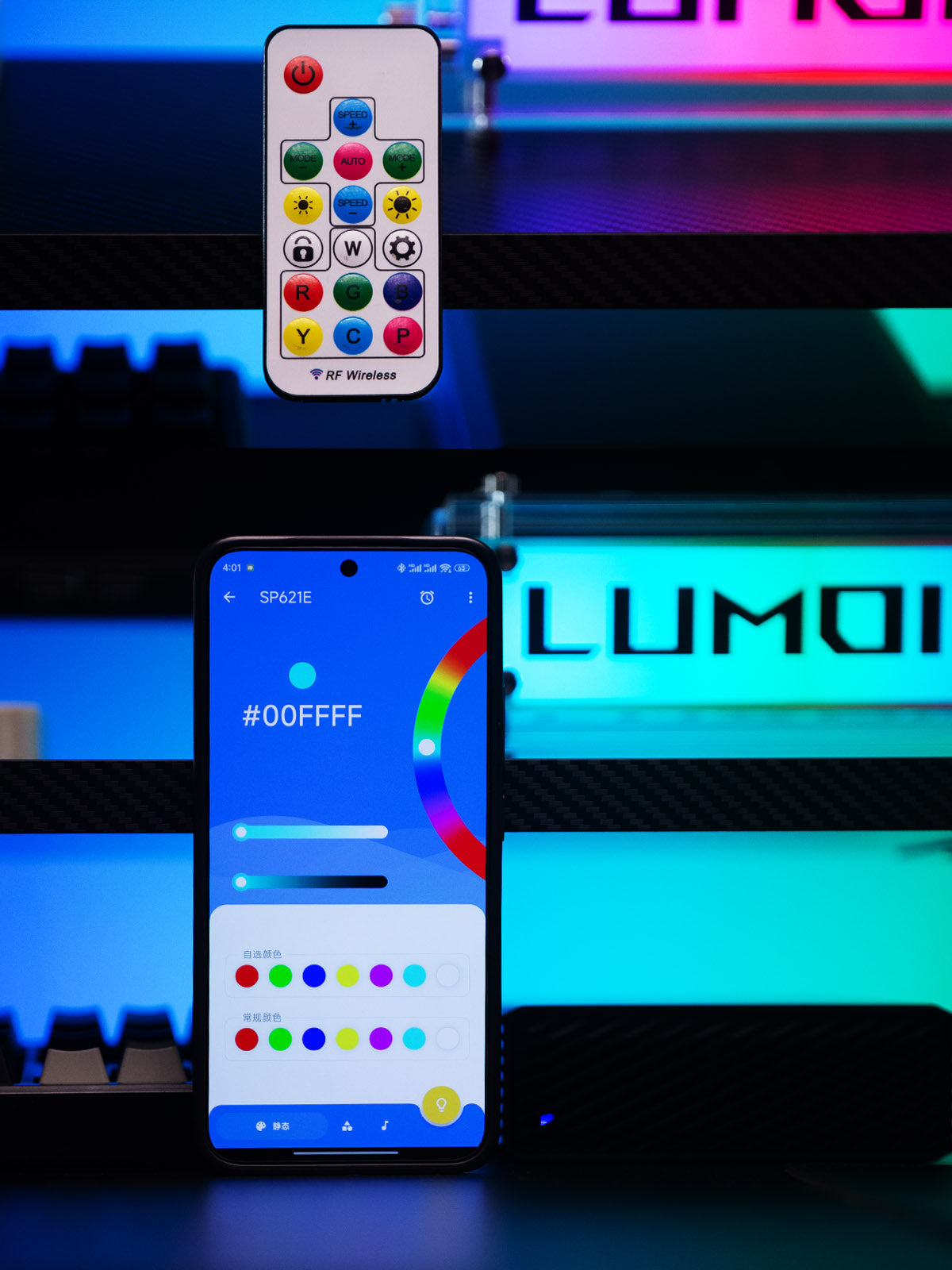 Smartphone with color selection app and remote control in front of colorful LED lights.