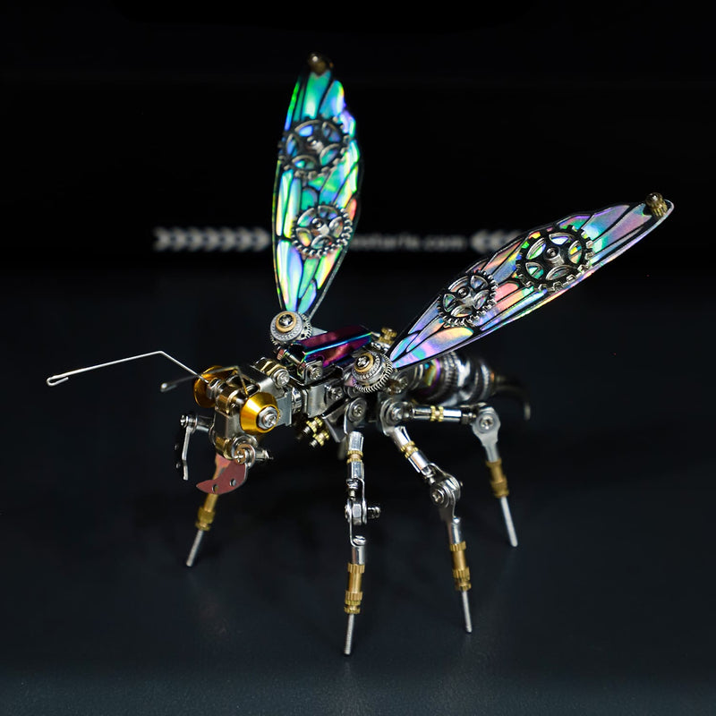 Metallic insect sculpture with iridescent wings on a dark background