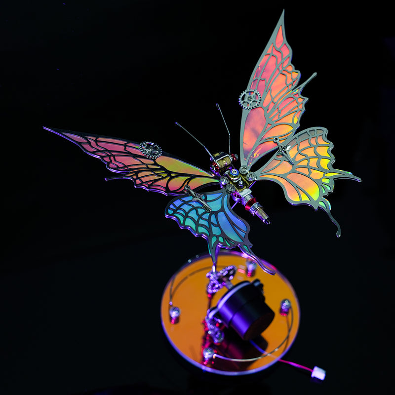 Colorful butterfly-shaped object with intricate design on a black background