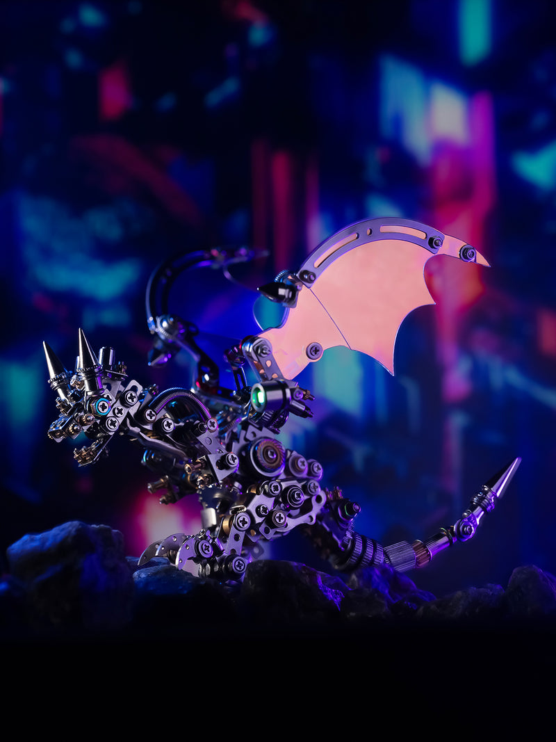 Mechanical sculpture with intricate details and a bat-like design against a dark background.