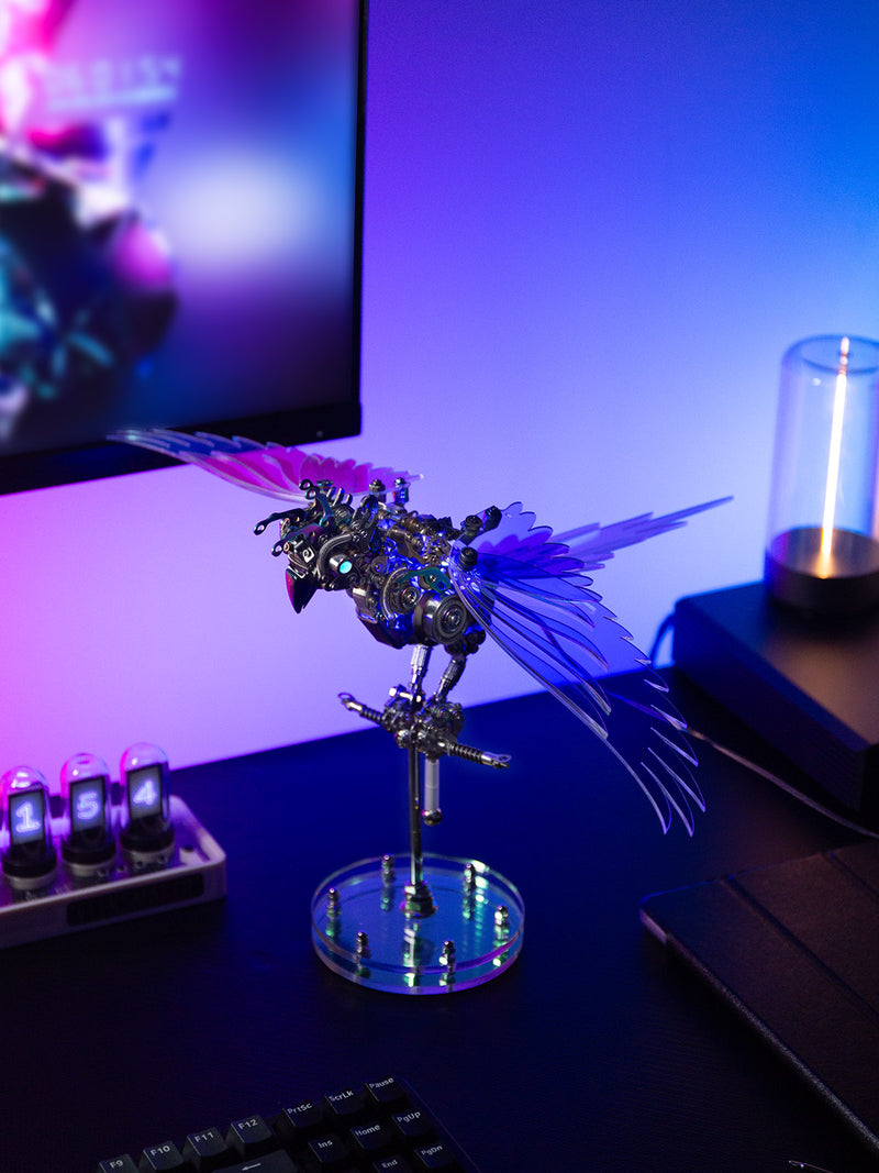 Decorative metal bird figure on a desk with colorful lighting