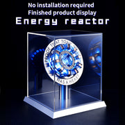 Energy reactor display with blue light effects on a black background