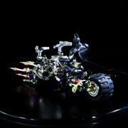 Toy robot on a reflective black surface with a dark background