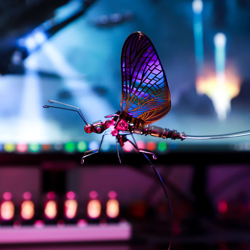 Colorful insect-like creature on a blurred colorful background
