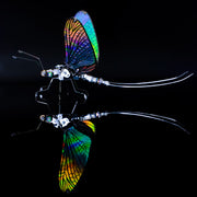Colorful butterfly-like insect model on a black background