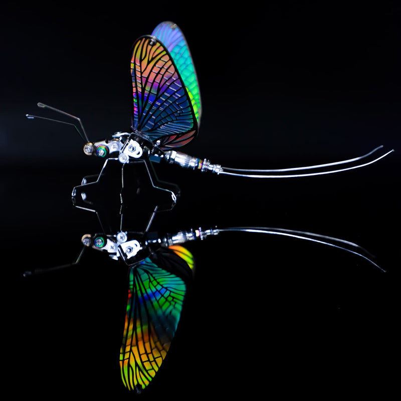 Colorful butterfly-like insect model on a black background