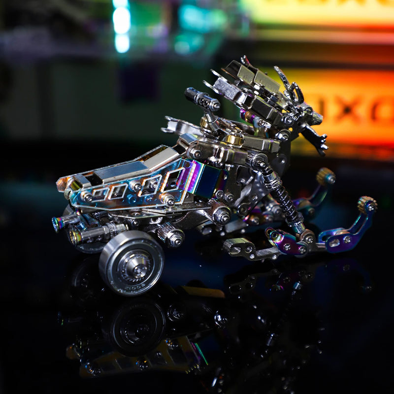 Metallic toy vehicle with intricate design on a reflective surface