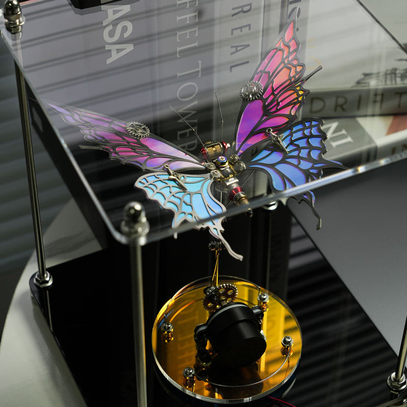 Mechanical butterfly model with colorful wings on a stand