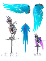 Metallic dragon sculptures with blue and purple wings on a white background