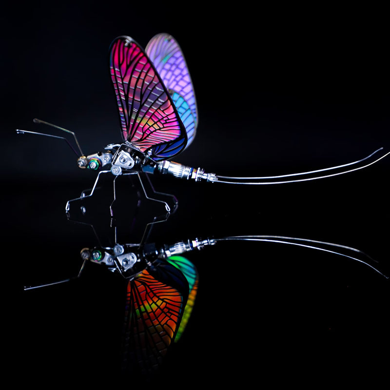 Colorful butterfly-shaped fishing lure on a black background