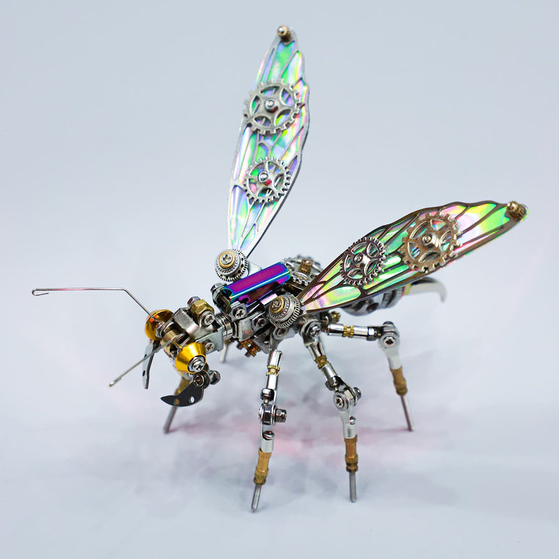 Metallic insect sculpture with mechanical components on a light gray background