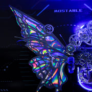 Metallic butterfly with gears on a dark background, featuring the brand 'MOSTARLE'.