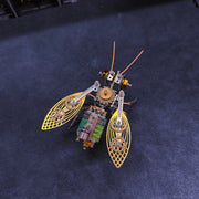 Mechanical insect model on a dark blue surface