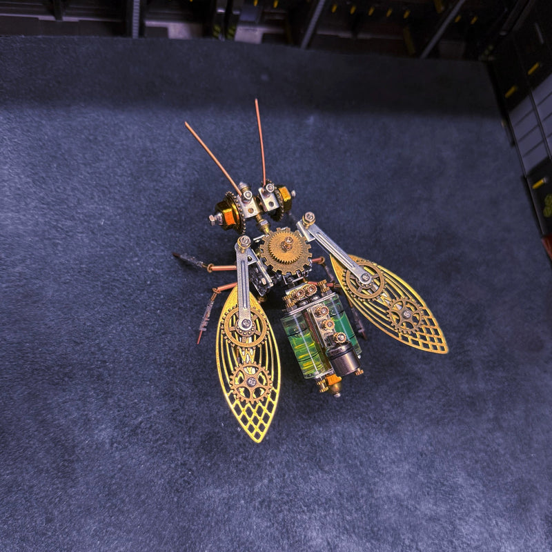 Mechanical insect model on a dark blue surface
