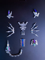 Collection of small mechanical figurines on a carbon fiber pattern background